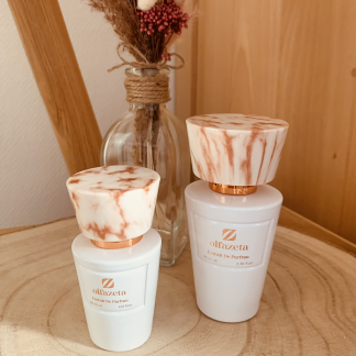 flacon de parfum femme Chogan sur fond bois